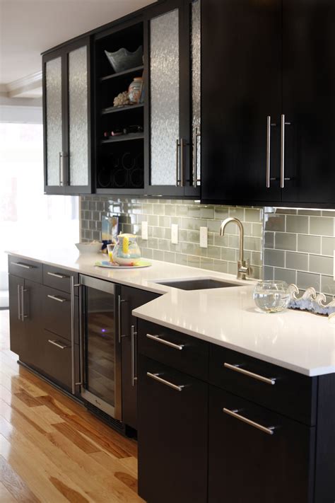 black cabinets with stainless steel counter|black kitchen cabinets.